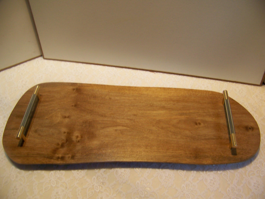 Live Edge Walnut Charcuterie Board with Brass/gray knurled handles.
