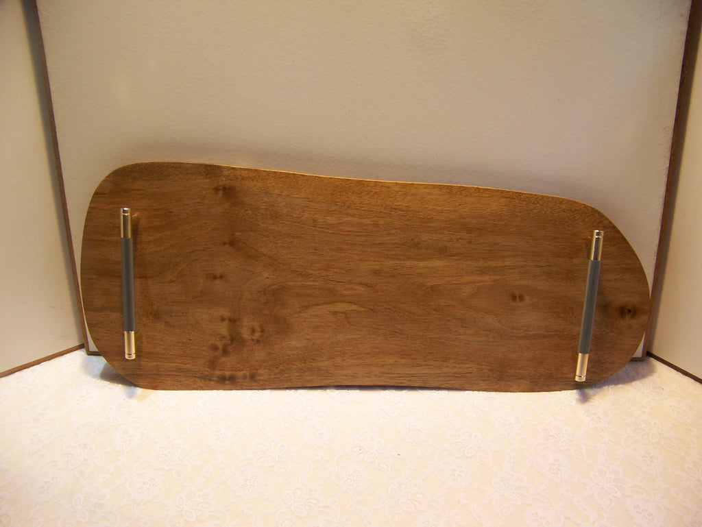 Live Edge Walnut Charcuterie Board with Brass/gray knurled handles.
