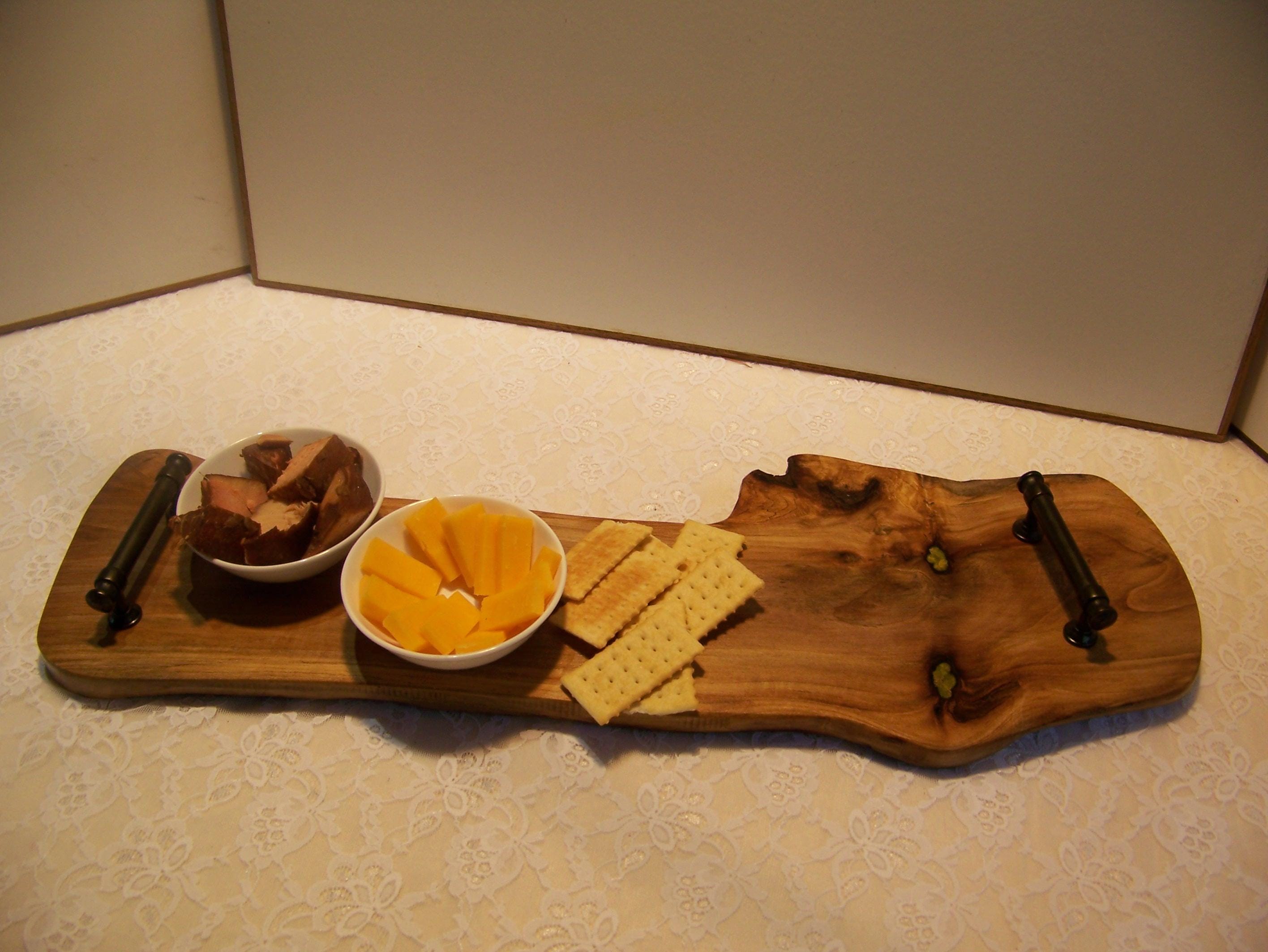 Live Edge Walnut Charcuterie Board with black handles