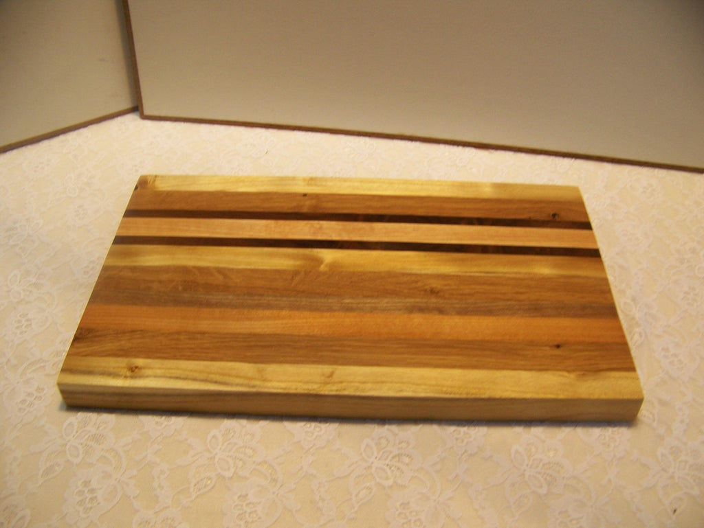 Cutting Board made using various hardwoods - pieced together