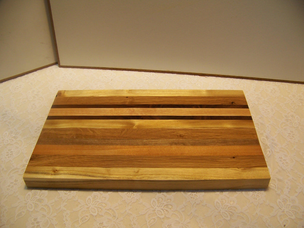 Cutting Board made using various hardwoods - pieced together
