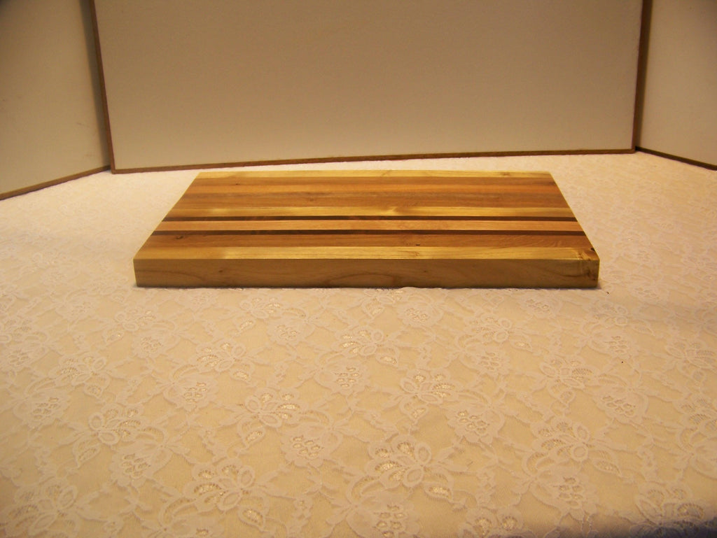 Cutting Board made using various hardwoods - pieced together