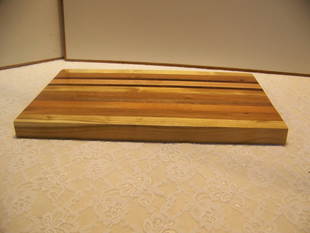 Cutting Board made using various hardwoods - pieced together