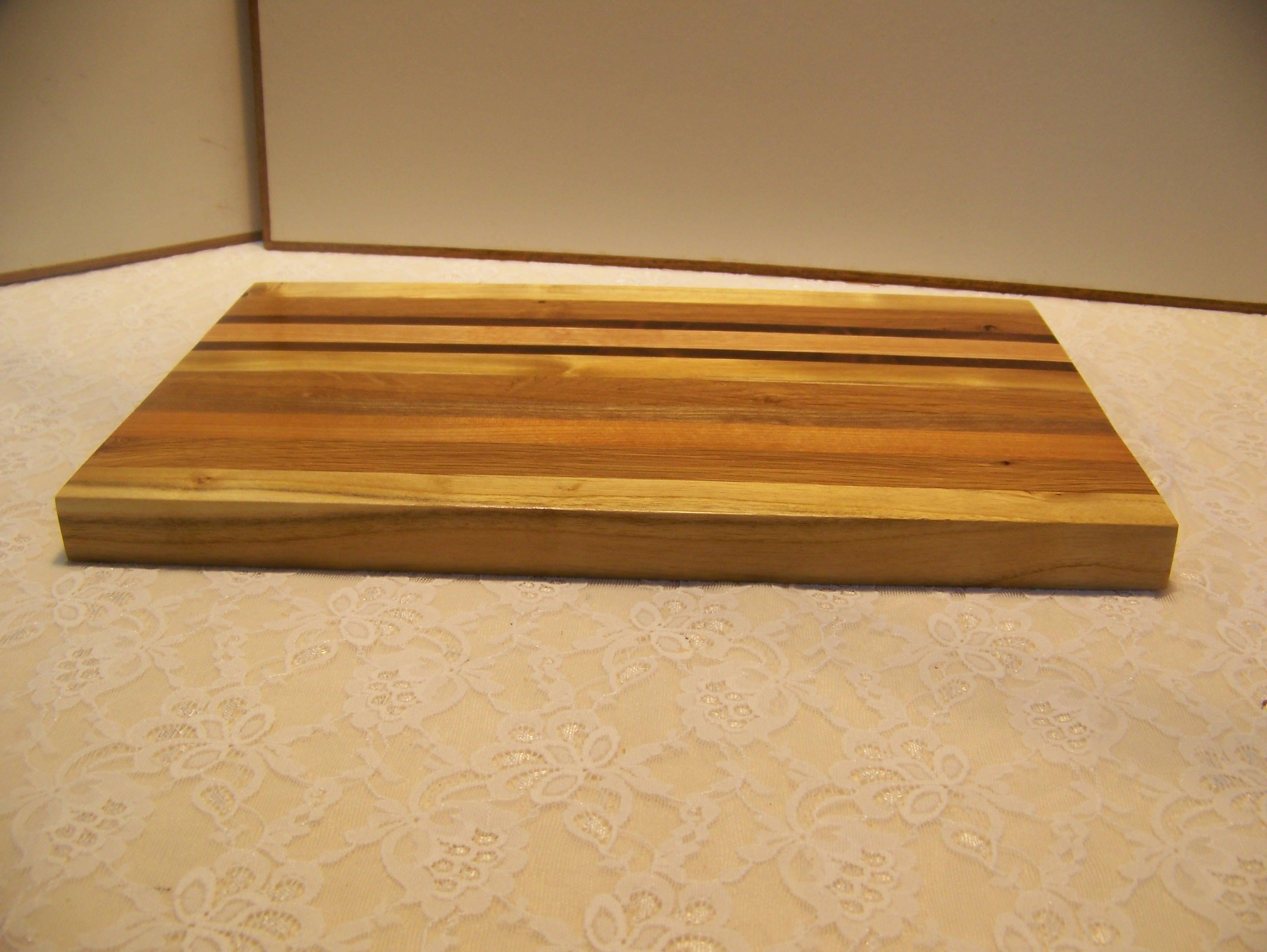 Cutting Board made using various hardwoods - pieced together