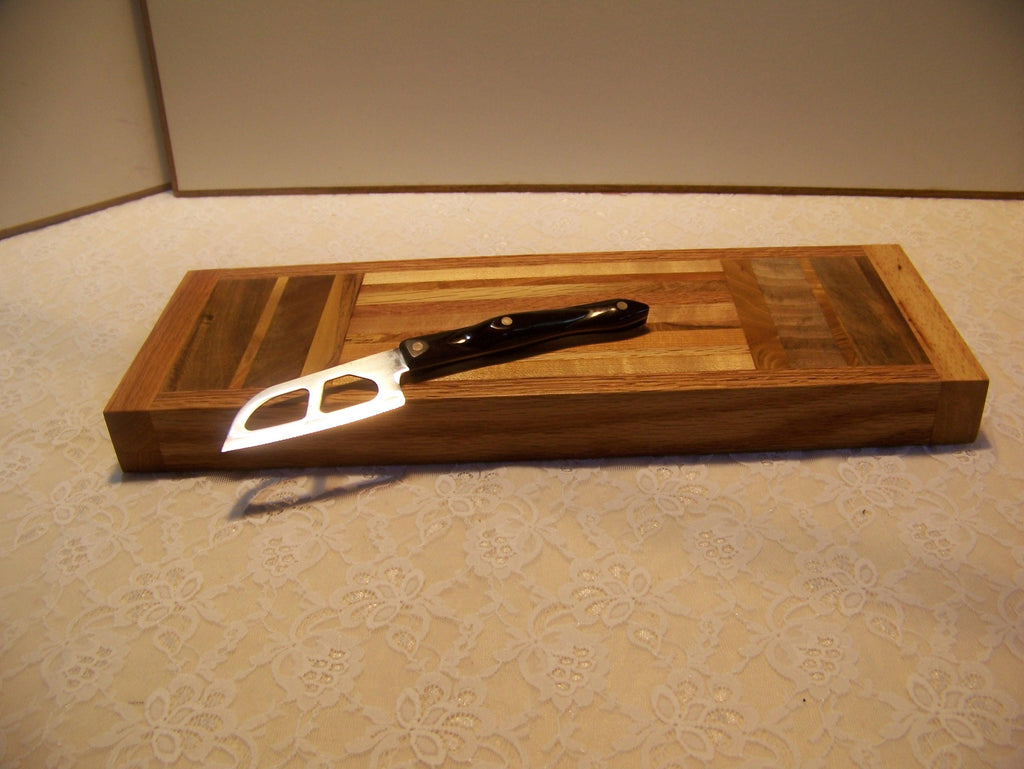 Cutting Board made using various Hardwoods - Pieced unique pattern.