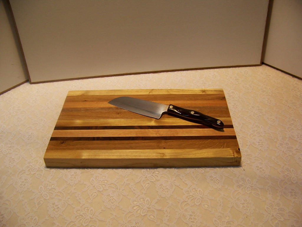 Cutting Board made using various hardwoods - pieced together