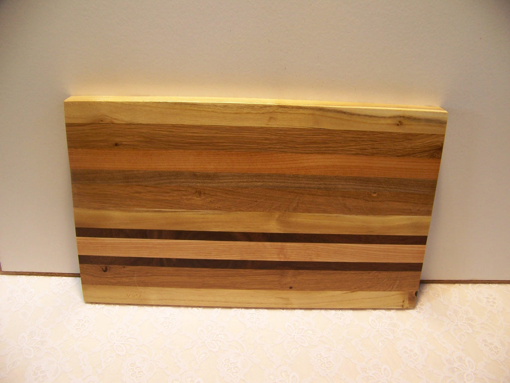 Cutting Board made using various hardwoods - pieced together