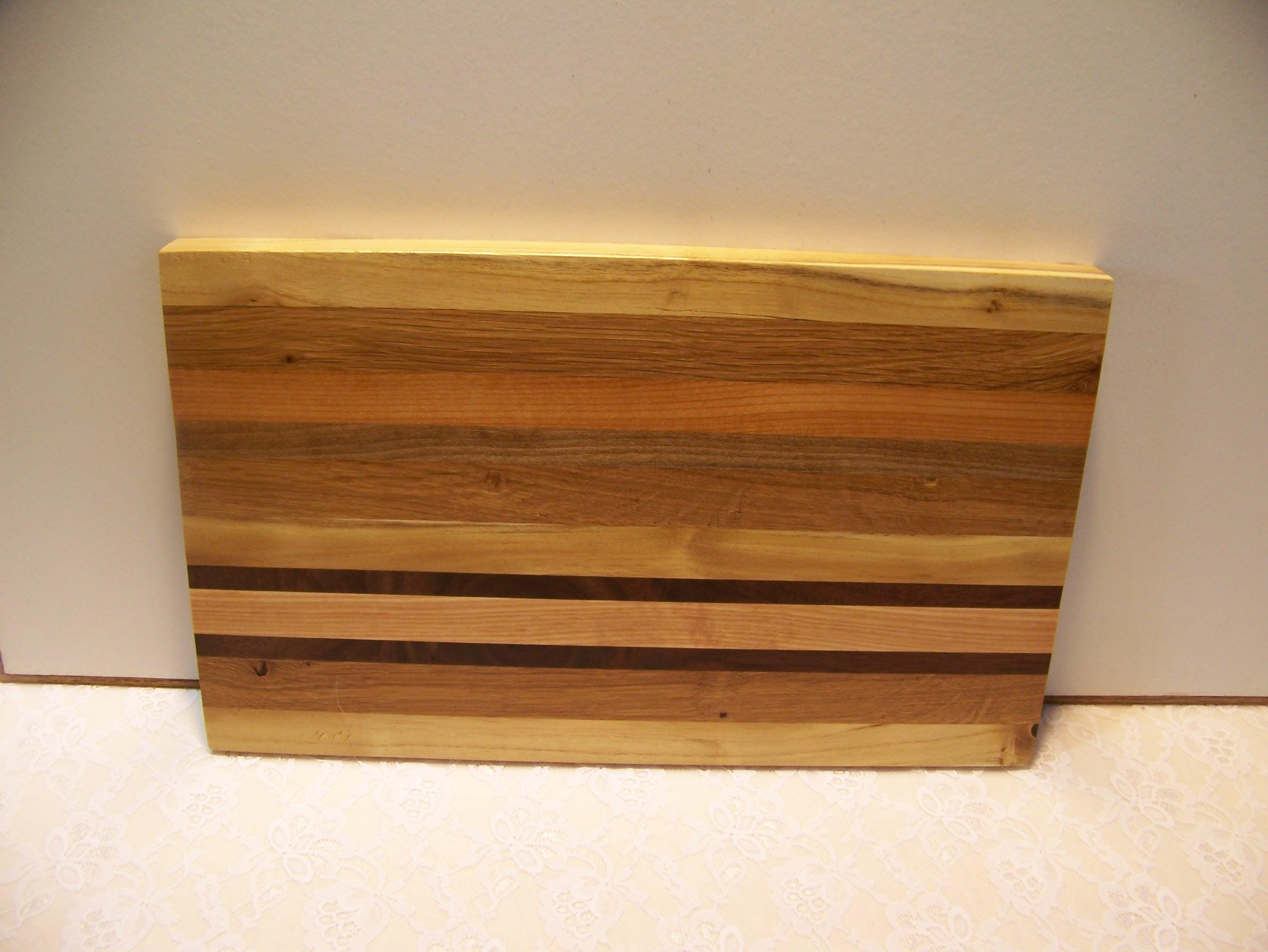 Cutting Board made using various hardwoods - pieced together