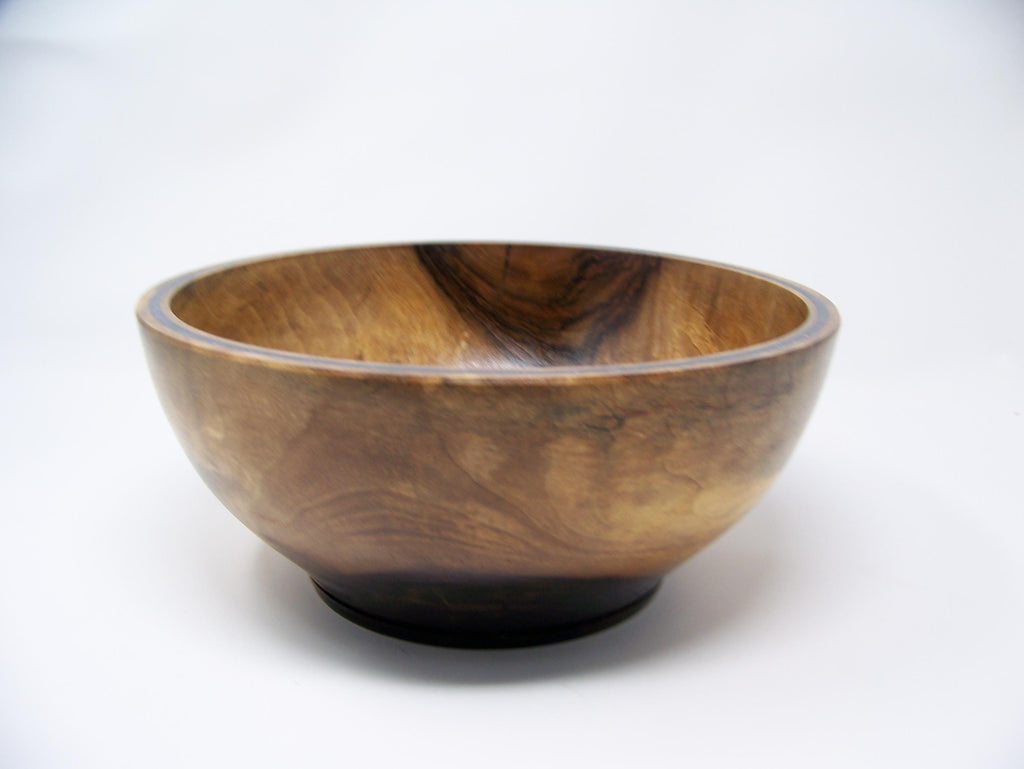 Black Walnut bowl with double row of epoxy glitter around rim