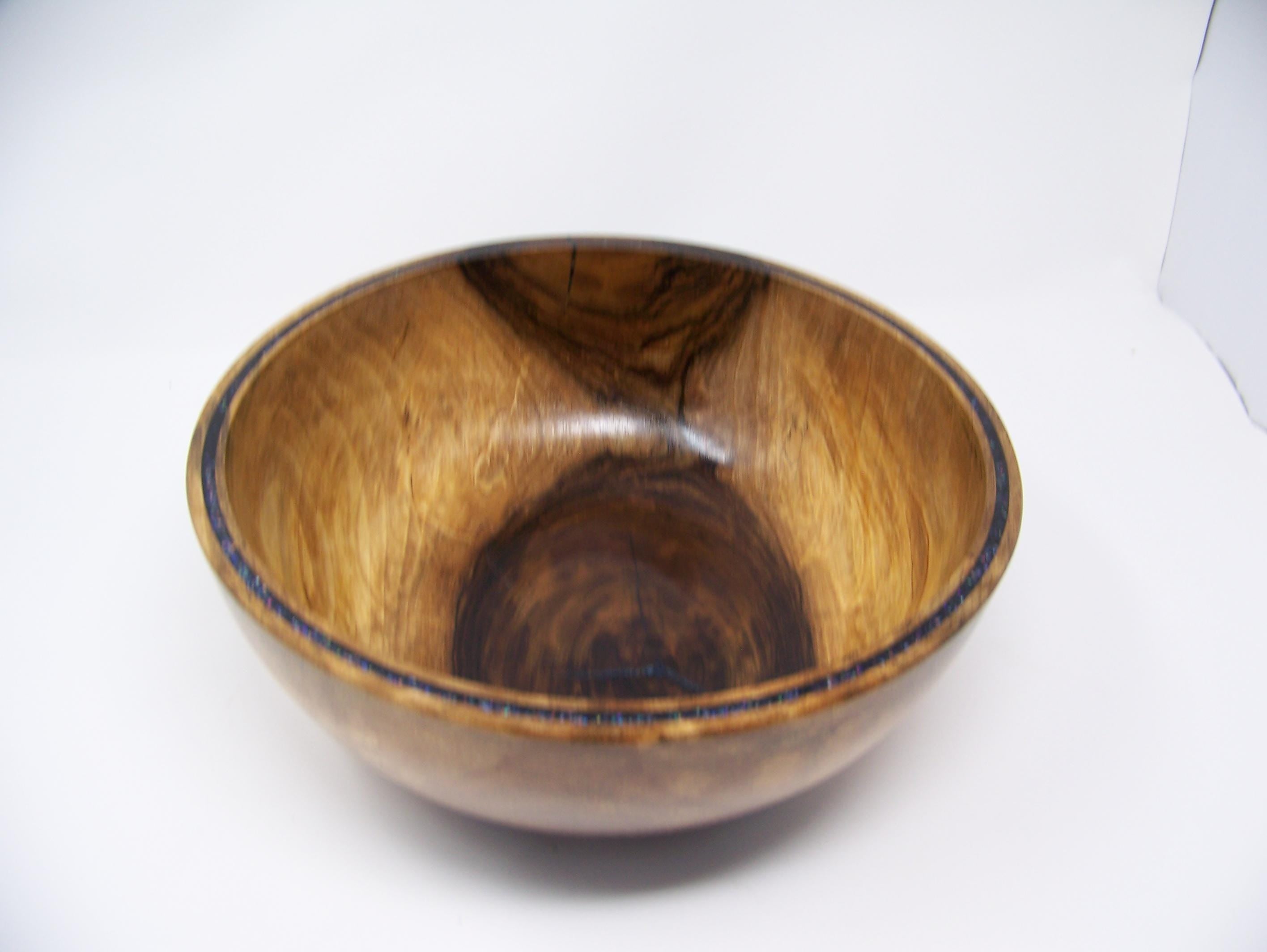 Black Walnut bowl with double row of epoxy glitter around rim
