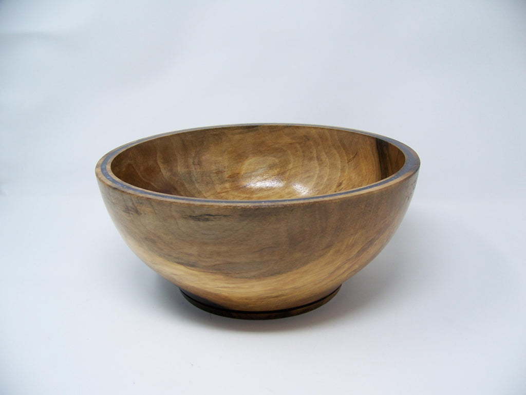 Black Walnut bowl with double row of epoxy glitter around rim