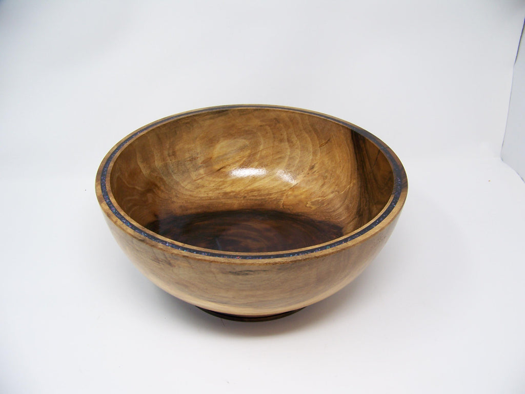 Black Walnut bowl with double row of epoxy glitter around rim