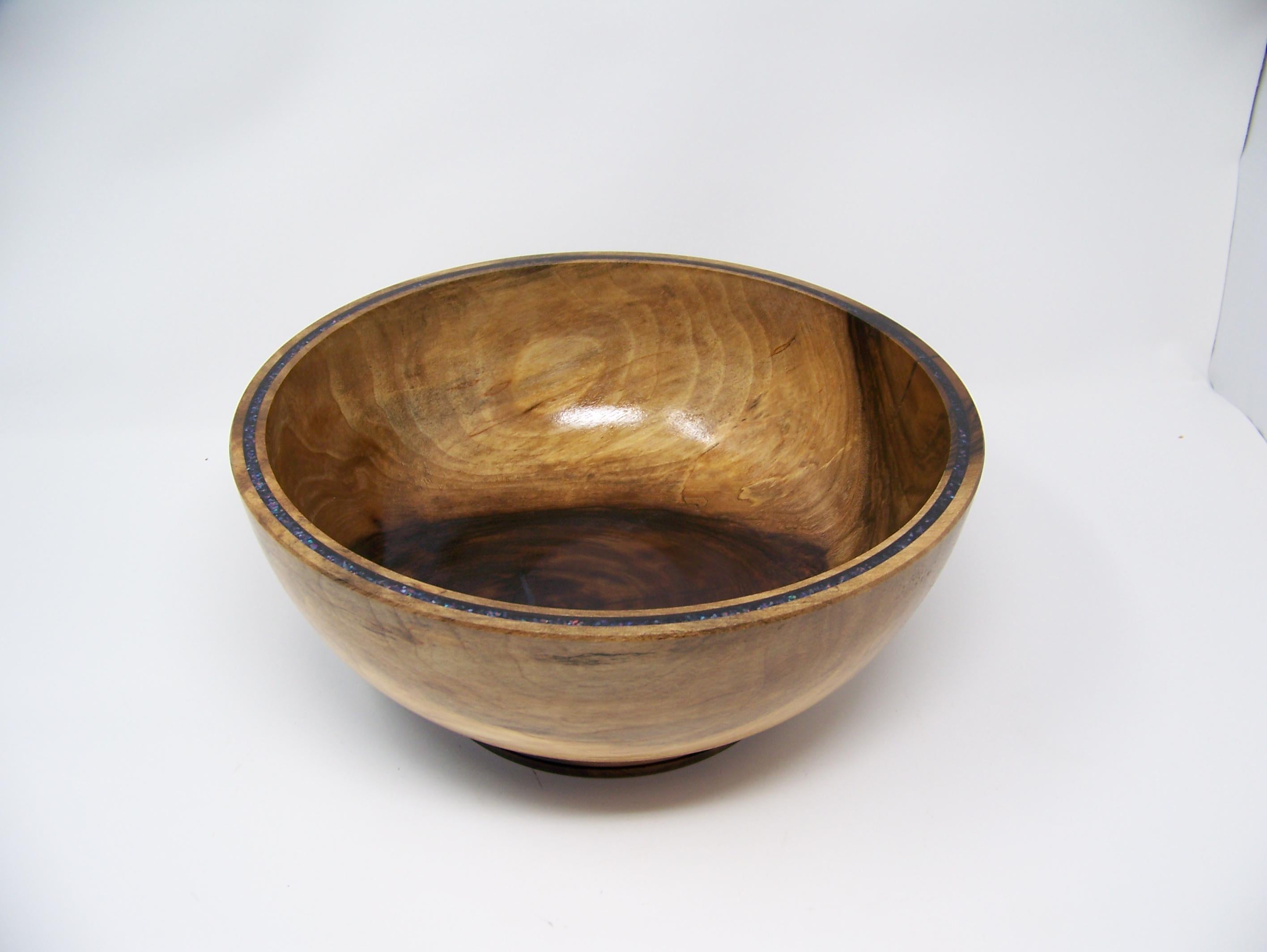 Black Walnut bowl with double row of epoxy glitter around rim