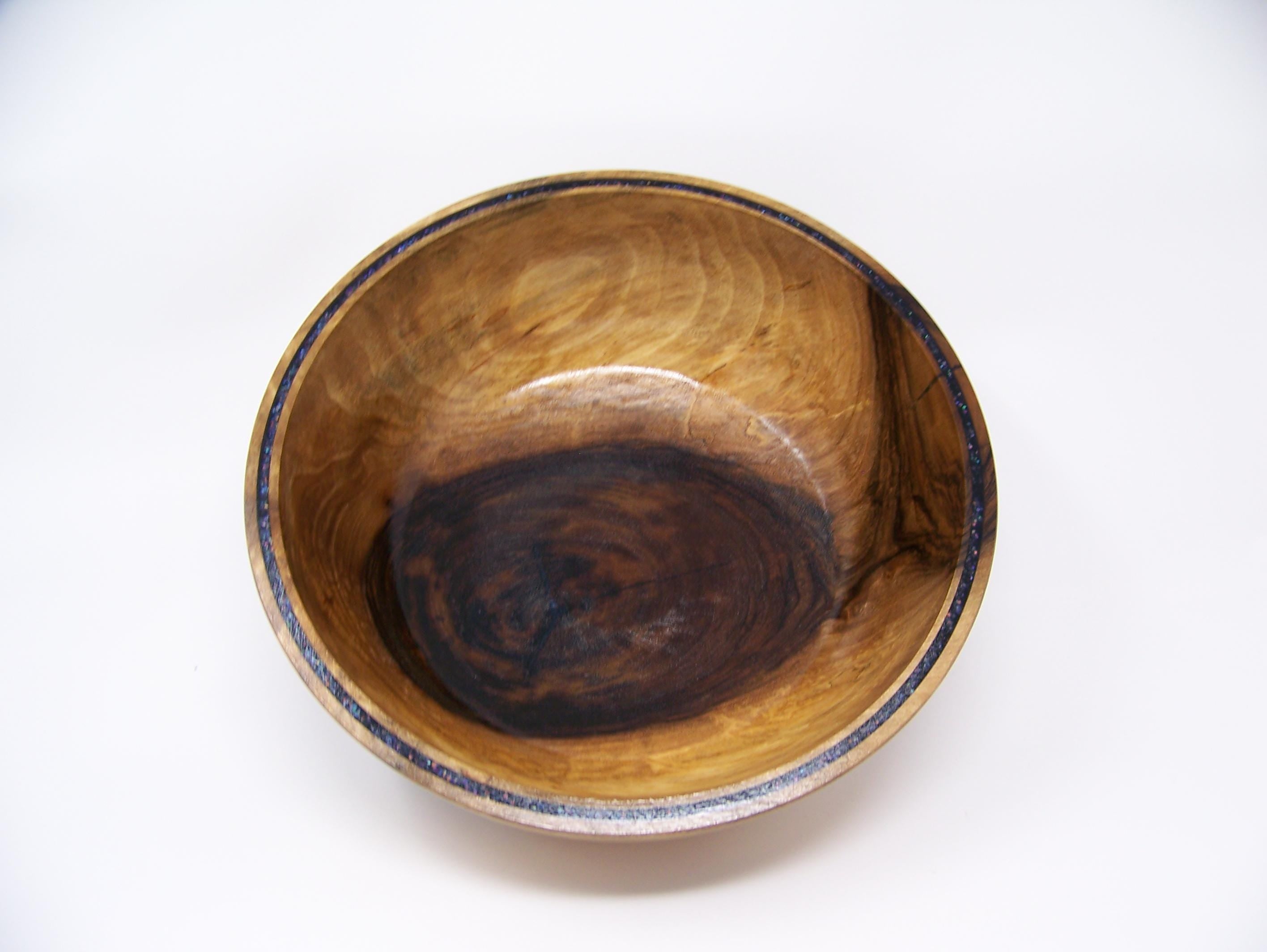 Black Walnut bowl with double row of epoxy glitter around rim
