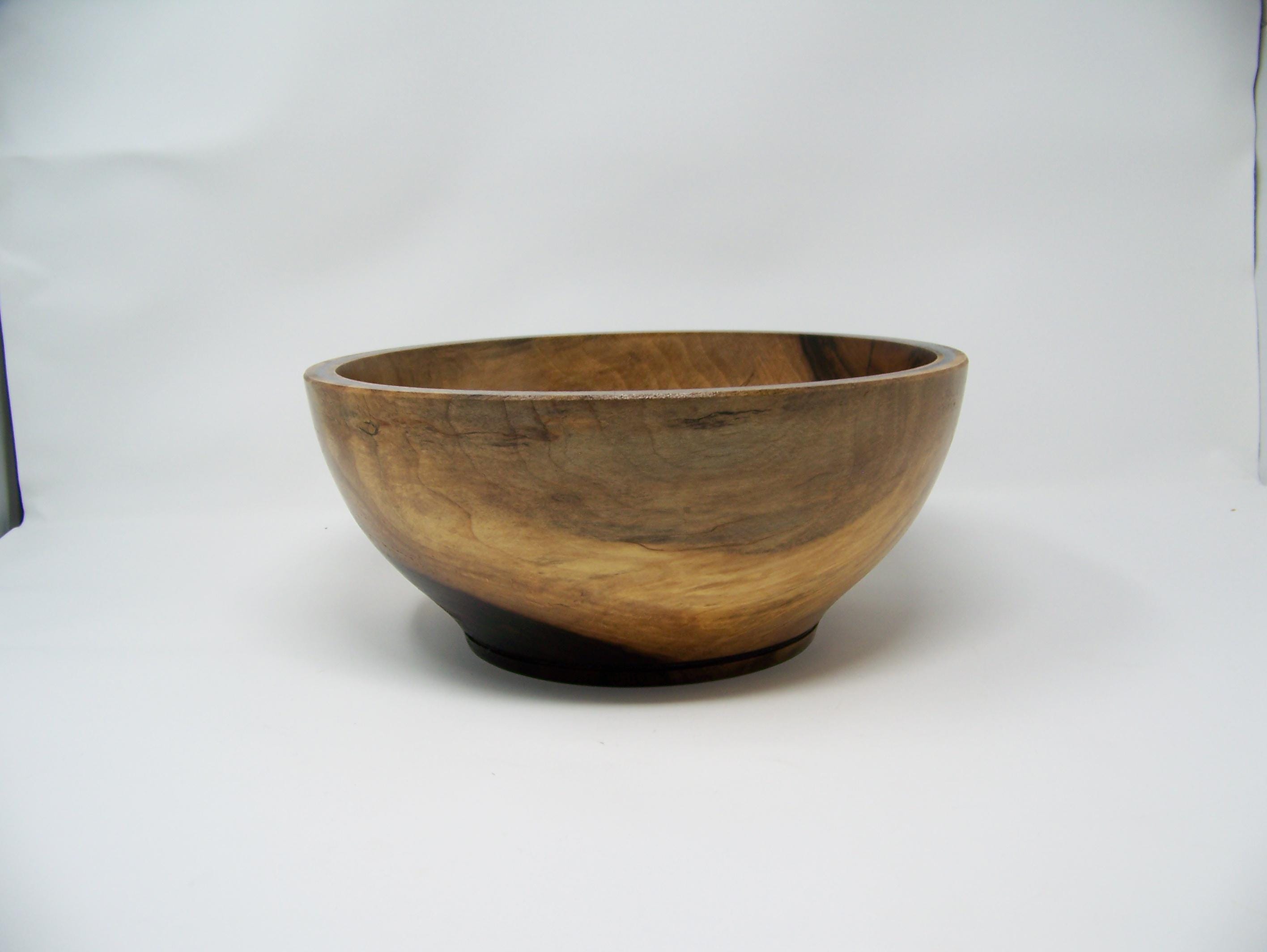 Black Walnut bowl with double row of epoxy glitter around rim